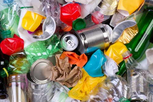 Business professionals managing waste in Swiss Cottage office
